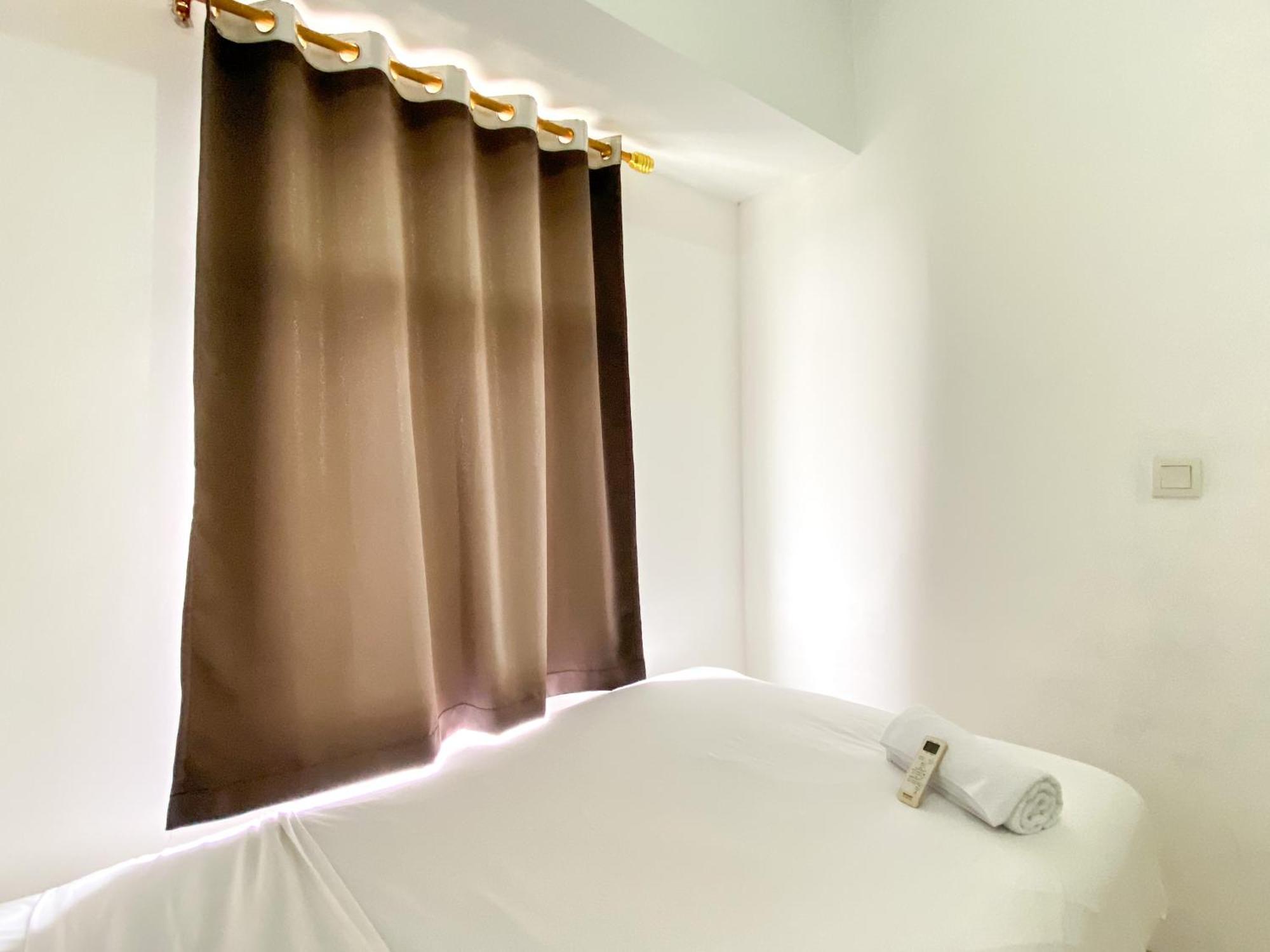 And Minimalist 2br At Springlake Summarecon By Travelio